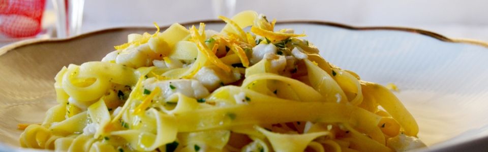 Primo piatto per la Vigilia di Natale: fettuccine spigola e arancia