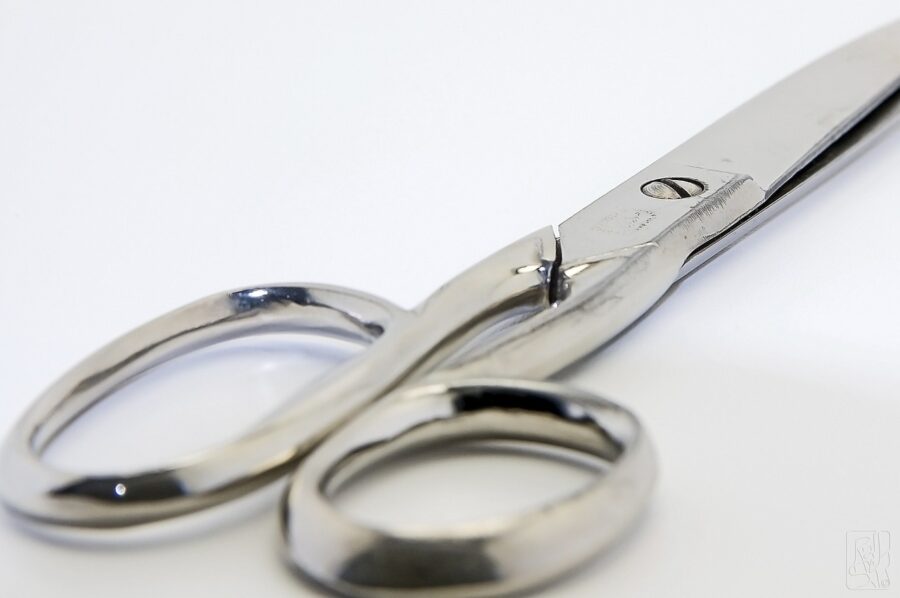 man attempts suicide by hitting himself with scissors