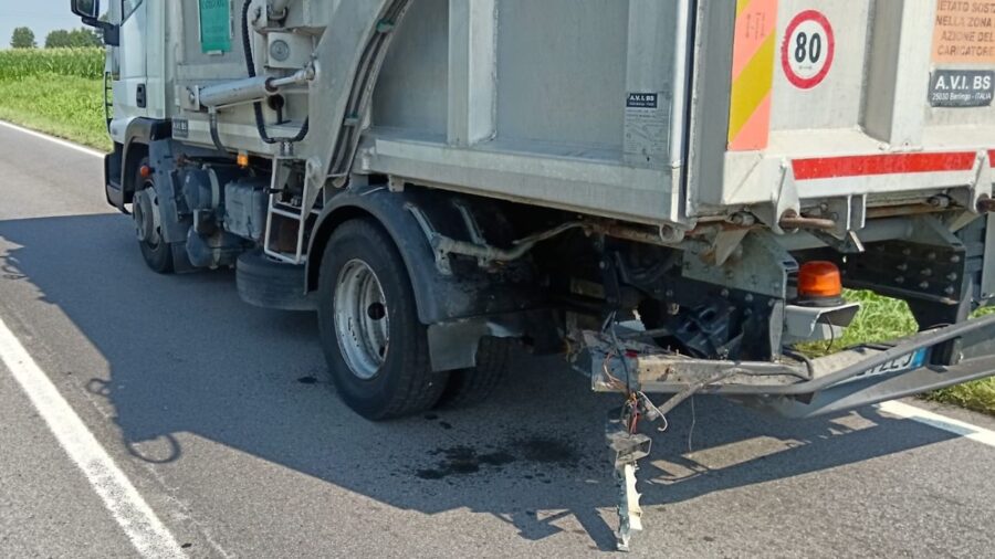 Road accident, motorcyclist hits a truck